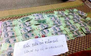 Cảnh giác với việc mua bán tiền giả